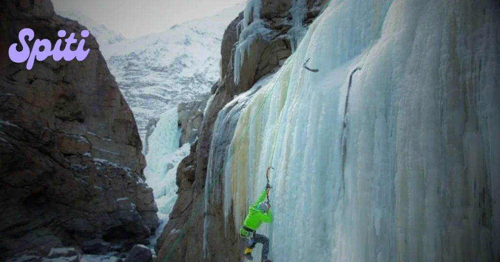 Ice climber ascending a frozen wall in Spiti